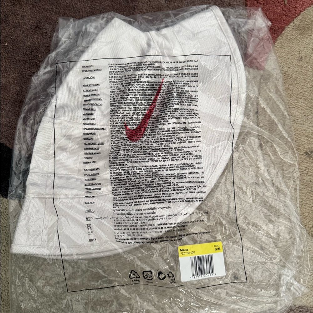 **brand new** never used white with red nike check supreme bucket hat